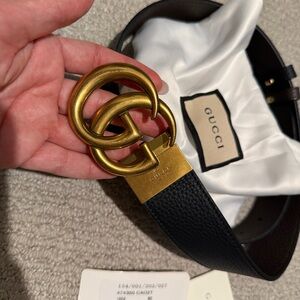 100% Authentic Gucci Black and Brown Leather Reversible Belt with Gold Buckle